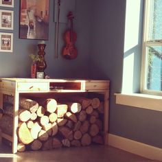 a room with wood stacked on top of each other