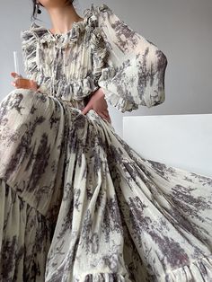 Elegant Flowy Floral Maxi Dress, Elegant Billowy Dress For Garden Party, Elegant Billowy Floral Print Maxi Dress, Elegant Billowy Floral Print Dress, Beige Billowy Dress For Spring, Elegant Billowy Beige Dress, Elegant Beige Billowy Dress, Billowy Long Dress For Spring, Billowy Long Spring Dress