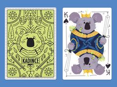 two playing cards with koalas on them, one in blue and the other in yellow