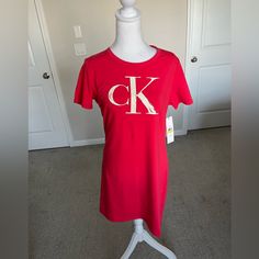 Nwt Calvin Klein Tshirt Logo Dress In Pink Size Medium. The Logo Has A Bit Of Sparkles In It. Cotton Spandex Blend, Loose Fit And Comfortable. Fitted Short Sleeve Calvin Klein T-shirt, Short Sleeve T-shirt Dress For Loungewear, Fitted Short Sleeve T-shirt Dress For Loungewear, Fitted T-shirt Dress For Loungewear With Short Sleeves, Calvin Klein Summer Loungewear Tops, Calvin Klein Fitted Top For Loungewear, Fitted Calvin Klein Short Sleeve T-shirt, Pink Tshirt Dress, Calvin Klein Tshirt