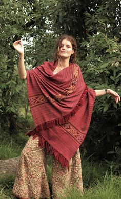 "These beautiful hand-loom shawls are made locally in a small village located in Himachal Pradesh. The shawls are made with a lovely blend of Himalayan merino wool, which is hand dyed with natural dyes. The artisan puts in a great effort to hand-loom such unique pieces. These shawls are 60% merino wool with 20% polyester. The reason why polyester is used for the boarder is because it eliminates fade, which ensures the integrity of the color. If you are looking for 100% merino wool that is possib