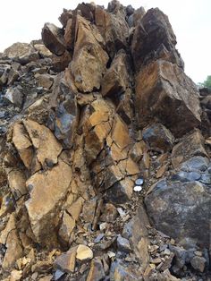 a large pile of rocks sitting on top of a mountain