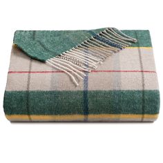 a green and white plaid blanket with fringes on it's edges, folded up