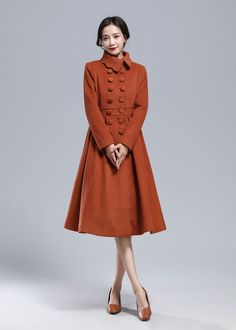 "The Caramel long coat is the ultimate in luxury women's outerwear and a real statement piece. The princess wool coat features pleating at the front adds structure whilst the cinched in waist and full skirt gives a feminine look. The stylish coat can be paired with your existing winter wardrobe easily and you'll find that this winter wool dress coat matches everything you own. DETAIL * More color optional https://etsy.me/3BUKkFB * 50% wool, 50% fiber, nylon, polyester * Polyester Lining * Lapel Single Breasted Brown Wool Coat For Spring, Brown Single Breasted Wool Coat For Spring, Brown Single-breasted Wool Coat For Spring, Elegant Brown Wool Coat For Spring, Fall Vintage Fashion Single-breasted Outerwear, Spring Brown Wool Coat With Button Closure, Fitted Long Brown Wool Coat, Wool Outerwear For Vintage Fashion With Long Sleeves, Vintage Wool Coat With Button Closure For Fall