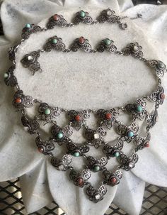 Circa 1800s Beautiful Art Nouveau Austro Hungarian Sterling Silver Coral Persian Turquoise Mother of Pearl Antique Festoon Bib Necklace See matching earrings in link below https://www.etsy.com/listing/693901515/circa-1800s-beautiful-art-nouveau-austro?ref=shop_home_active_1&frs=1 Traditional Jewelry With Historical Design For Collectors, Ornate Multi-stone Jewelry For Ceremonial Occasions, Traditional Turquoise Filigree Jewelry, Traditional Turquoise Jewelry With Filigree, Vintage Turquoise Jewelry With Intricate Design, Victorian Turquoise Necklace For Wedding, Victorian Multicolor Jewelry For Wedding, Victorian Turquoise Filigree Jewelry, Ornate Multicolor Jewelry With Intricate Design