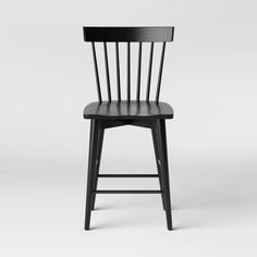 a black wooden chair on a white background