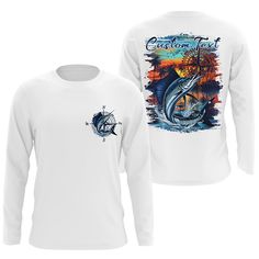 a white long - sleeved shirt with an image of a sailboat on it