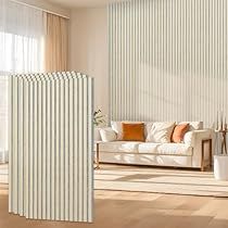 a living room filled with furniture and walls covered in white vertical blind blinds on the windows