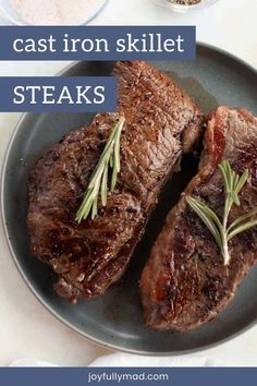 two steaks on a plate with seasoning and salt in the background text reads cast iron skillet steaks