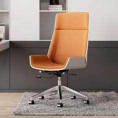 an orange office chair sitting on top of a rug in front of a book shelf