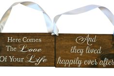 two wooden signs that say, here comes the lone loved of your life and happily ever after