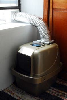 a blow dryer sitting on top of a window sill