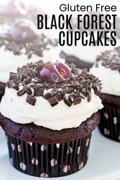 cupcakes with white frosting and chocolate sprinkles