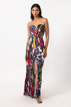 Multi colored hand micro pleated strapless gown with all-over abstract floral prints and side slit.
Components: 1
Pattern: Printed
Type Of Work: Abstract Floral Patterns
Neckline: Sweetheart
Sleeve Type: Sleeveless
Fabric: Chiffon, Satin
Color: Multi Color
Other Details: 
Strapless gown
Smocked back
Note: Kindly contact customer service to customise the slit
Occasion: Party - Aza Fashions Printed Maxi Dress Indian, Maxi Dress Indian, Abstract Floral Print, Strapless Gown, Gowns Online, Saree Dress, Satin Color, Pleated Maxi Dress, Indian Fashion Designers