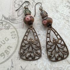 Bronze Wire Wrapped Czech Glass Earrings, Bronze Wire Wrapped Earrings With Czech Glass, Bohemian Bronze Earrings With Round Beads, Handmade Bronze Czech Glass Earrings, Bronze Czech Glass Jewelry With Ear Wire, Bohemian Bronze Chandelier Earrings With Ear Wire, Handmade Bronze Jewelry With Czech Glass, Handmade Vintage Brass Beaded Earrings, Handmade Czech Glass Bronze Jewelry