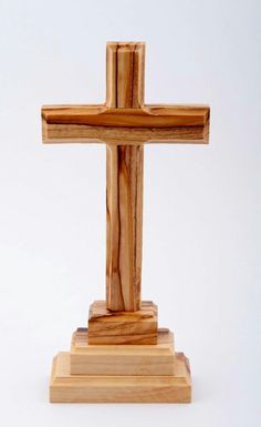 a wooden cross on a white background