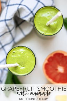 grapefruit smoothie with pineapple and oranges on the side for garnish