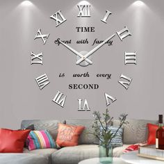 a living room wall clock with roman numerals on the face and words that read, time spent with fairy is worth every second