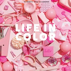 a pink poster with the words life in color on it and lots of other items