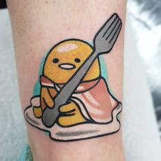 a cartoon character with a fork and knife on his leg that has been drawn onto