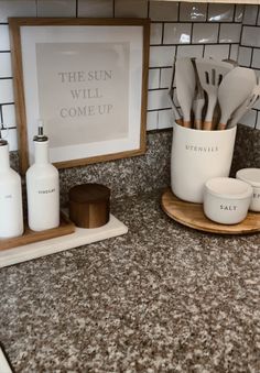 the kitchen counter is clean and ready to be used for cooking or baking with utensils