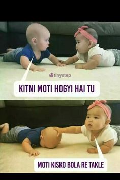 two baby babies playing with each other on the floor, one is touching another's head