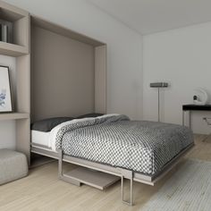 a bed sitting next to a book shelf on top of a wooden floor in a bedroom