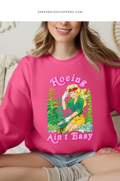 Step into the world of Barbiecore and channel your inner gardener while rocking this cute, girly graphic sweatshirt. With its vintage Barbie-inspired design and aesthetic, this retro crewneck is the perfect addition to your Pinterest-worthy wardrobe. Retro Crewneck, Sweatshirt Aesthetic, Club Sweatshirts