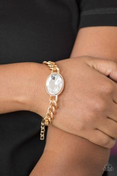 An oversized white gem attaches to a bold gold chain, creating a dramatic centerpiece atop the wrist. Features an adjustable clasp closure. Sold as one individual bracelet. P9RE-GDXX-163XX Paparazzi Accessories Jewelry, Jewelry Images, Paparazzi Accessories, Gold Bracelet Chain, White Rhinestone, Bracelet Clasps, Rhinestone Bracelet, Paparazzi Jewelry, Boutique Jewelry