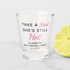 a shot glass that says take a shot he's still hot