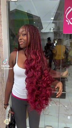 Tight, spiral-shaped curls that add a playful touch to the hair. Burgundy Red Goddess Braids, French Curls Extensions, 22 Inch Braids, Black N Red Braids, Maroon Braids With Beads, Red Braids With Curls At The End, Wine French Curls Braids, Black And Red French Curl Braids, Burgandy Braids On Dark Skin