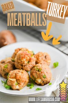 baked turkey meatballs on a white plate with text overlay that reads baked turkey meatballs