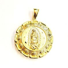 ITEM DESCRIPTION: Beautiful New 10k yellow gold hollow two sided Jesus face and virgin Guadalupe pendant. This beautiful pendant has two sides, one side is Jesus face and other side is virgin Guadalupe. Weight: 18.8 grams Metal: 10k genuine gold 1.78 inches diameter please ask me any questions you may have before you make a purchase. Please refer to the photo of the item next to a quarter for comparison purposes. Shipping: Your order will be professionally packed and shipped. US free shipping is for the 48 Continental states. For shipping to Alaska, Hawaii and Puerto Rico please contact us for a quote. We also offer overnight shipping for the cost of $25.00 which the estimated delivery time is one business day. Return Policy: 30 Day Money Back Guarantee We want your online shopping experie Gold Our Lady Of Guadalupe Medallion, Gold Virgin Mary Medallion Charm, Gold Virgin Mary Medallion Jewelry, Gold Virgin Mary Medallion, Gold Medallion With Virgin Mary, Spiritual Yellow Gold Our Lady Of Guadalupe Jewelry, Virgin Guadalupe, Jesus Face, Puerto Rico