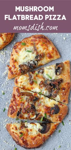 mushroom flatbread pizza with cheese and mushrooms on top, cut in half to be eaten