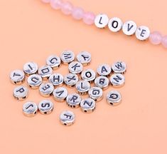 Sterling Silver Antique Letter Bead Silver Character Bead A-Z 26 Letters Bead Name Bracelet Size: ~6.5mm x 6.5mm x 2.5mm Hole: ~1.1mm , Weight: ~0.75g ❈❈ More Choice ❈❈ More beads/spacer : https://www.etsy.com/shop/ShinyShinySoul?section_id=11979147 More bead caps : https://www.etsy.com/shop/ShinyShinySoul?section_id=19758775 More Pendants/Charms : https://www.etsy.com/shop/ShinyShinySoul?section_id=17615392 More Chain/accessories : https://www.etsy.com/shop/ShinyShinySoul?section_id=17610233 Mo Adjustable Letter Beads For Jewelry Making, Round Letter Beads Jewelry For Gift Making, Heart-shaped Round Beads For Crafts, Heart-shaped Round Beads For Crafts And Gifts, Heart Shaped Beads For Crafts And Gifts, Handmade Silver Beaded Bracelets For Valentine's Day, Valentine's Day Silver Beaded Bracelets With Round Beads, Personalized Round Beads For Crafting, Valentine's Day Silver Beaded Bracelets