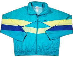 Blue Retro Windbreaker For Streetwear, Retro Blue Windbreaker For Streetwear, 90s Style Blue Track Jacket For Fall, Retro Blue Windbreaker For Spring, Blue Retro Track Jacket For Spring, Retro Track Jacket For Spring Streetwear, Blue Fitted Casual Windbreaker, Retro Spring Track Jacket For Streetwear, Retro Spring Windbreaker For Outdoor