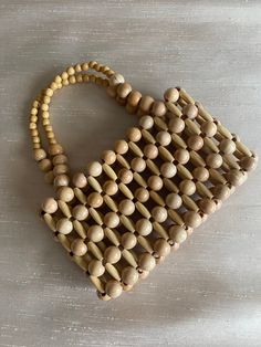 Handmade bohomian style wood beaded bag Size: Width:19 cm Heights:12cm 💝Thank you for shopping at my small business.  With love. Leyla Crafts Natural Rectangular Bag With Wooden Beads, Rectangular Natural Bag With Wooden Beads, Beaded Rectangular Shoulder Bag In Natural Color, Rectangular Beaded Shoulder Bag In Natural Color, Beaded Natural Rectangular Shoulder Bag, Natural Beaded Rectangular Shoulder Bag, Natural Beaded Rectangular Bag, Brown Bag With Wooden Beads For Everyday Use, Natural Beaded Shoulder Bag For Daily Use