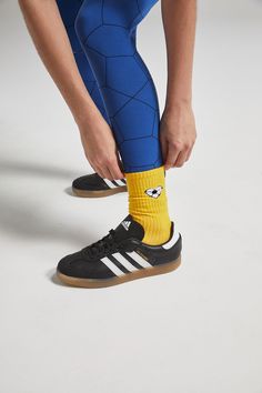 Meet the functional, foot-hugging sock you can feel good about. Carefully crafted with a bottom cushion for extra comfort, our Passion Crew socks are made from melange cotton for the perfect balance of soft and snug. Our pairs feature our new signature soccer heart icon. Comfortable enough to go socks-only, fitted enough to slip into any shoe and go, go, go. Sustainably made in the USA to support local jobs, proceeds support city-youth health via Ucal McKenzie Breakaway Foundation. Size chart:Small/MediumUS Sock Size Women 6 to 9US Sock Size Men 8 to 10Large/Extra LargeUS Sock Size Women 10-13US Sock Size Men 11-14 Soccer Heart, Soccer Love, Youth Empowerment, Heart Icon, Support Local, Crew Socks, Black N Yellow, Feel Good, Organic Cotton