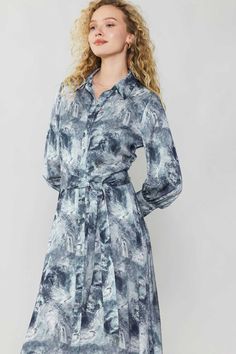 With its swirling marbleized print, this shirt dress is guaranteed to captivate. Wear it buttoned all the way up for a refined look, or leave it undone to channel a more relaxed vibe. The tie belt is optional, so you can cinch the waist or let it flow. Finally the ultra plush and silky feel of the fabric provides true comfort and everyday luxury. •Ultra soft •Pointed collar •Slim fit •Button placket •Three quarter sleeves •Button cuffs •Optional tie belt •Mid-length hem DIMENSIONS •Standard: 50" Shirt Midi Dress, Print Shirt Dress, Milly Dress, Let It Flow, Button Down Shirt Dress, Everyday Luxury, Water Consumption, Printed Shirt Dress, Midi Shirt Dress