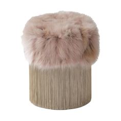 a small stool with fur on top of it