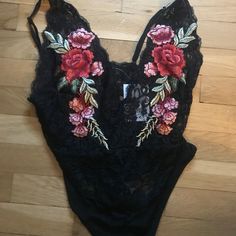 Low Cut Floral Black Bodysuit Never Worn. Still Has Tags. Size Medium Forever 21 Trendy Black Bodysuit, Forever 21 Party Bodysuit With Lined Body, Aesthetic Intimates, Body Suits, Floral Bodysuit, Forever21 Tops, Black Bodysuit, Forever 21 Tops, Low Cut