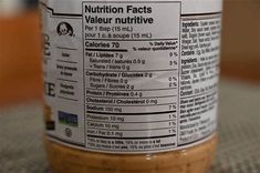 a jar of peanut butter sitting on top of a table