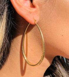 18kt Gold Filled Large Textured Hoop Earrings Hoop Size: 65mm Width: 4.5mm Clasp: Hinged  Material: 18 Karat Gold Filled, Hypoallergenic. Tarnish Resistant. Gold-filled does not de-laminate or peel like Gold plated Jewelry nor does it tarnish as readily as silver. Generally speaking, gold filled is better quality and will have a much longer lasting color than plated jewelry. We recommend keeping abrasive chemicals away from the jewelry for the items to last. Thank you for visiting and supporting Teardrop Gold Plated Hoop Earrings, Gold Hoop Teardrop Earrings, Tarnish Resistant, Hoops Gold, Gold Filled Hoops, Hammered Gold, Earrings Hoop, Alessandra Ambrosio, Large Hoop Earrings, Vanessa Hudgens