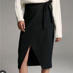 This Is A Faux-Wrap Skirt With A Wide, Front Slit And A Side-Tie Detail. Color: Black Rise: High Length: Mid-Calf Content: 45% Polyester, 35% Viscose, 15% Acrylic, 5% Elastane Care: Machine Wash Women Skirts Midi, Wrap Skirt, Mid Calf, Black Color, Pencil Skirt, Midi Skirt, Womens Skirt, Size 2, Pencil