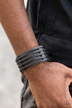 A thick black leather band has been spliced into skinny strands that interweave through leather belt loops across the wrist for a rugged look. Features an adjustable snap closure. Sold as one individual bracelet. P9UR-BKXX-373XX Paparazzi Consultant, Urban Jewelry, Starting Line, Black Leather Bracelet, Snap Bracelets, Rugged Look, Black Bracelet, Mens Black Leather, Black Bracelets