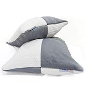 two pillows sitting on top of each other