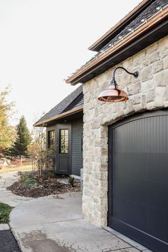 a garage door with a light hanging from it