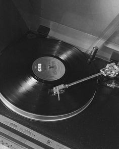 an old record player with its turntable removed