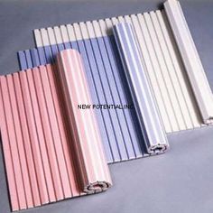 four different colors of metal slats on a gray surface with the word new potential written in