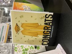 there is a card with an image of a woman's yellow dress on it